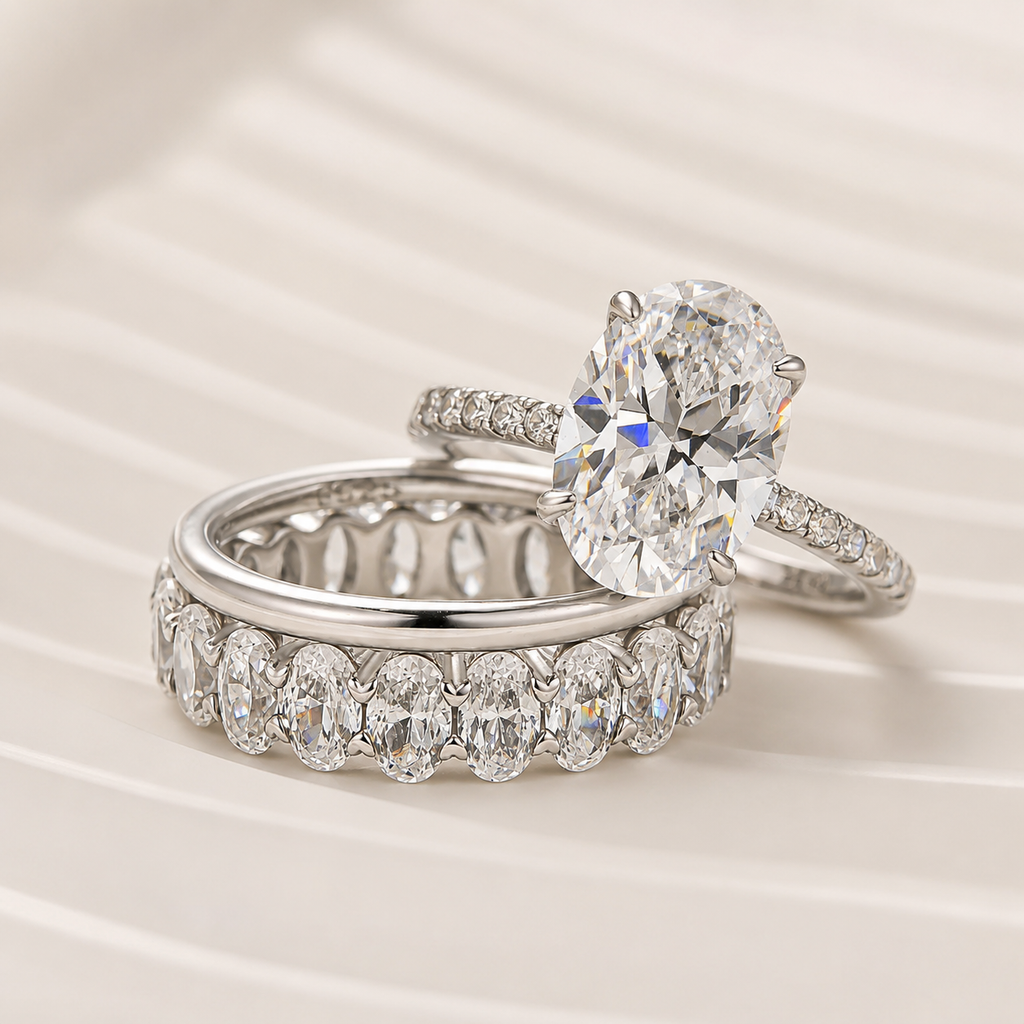 Elara three-piece oval wedding ring set in white gold – studio view