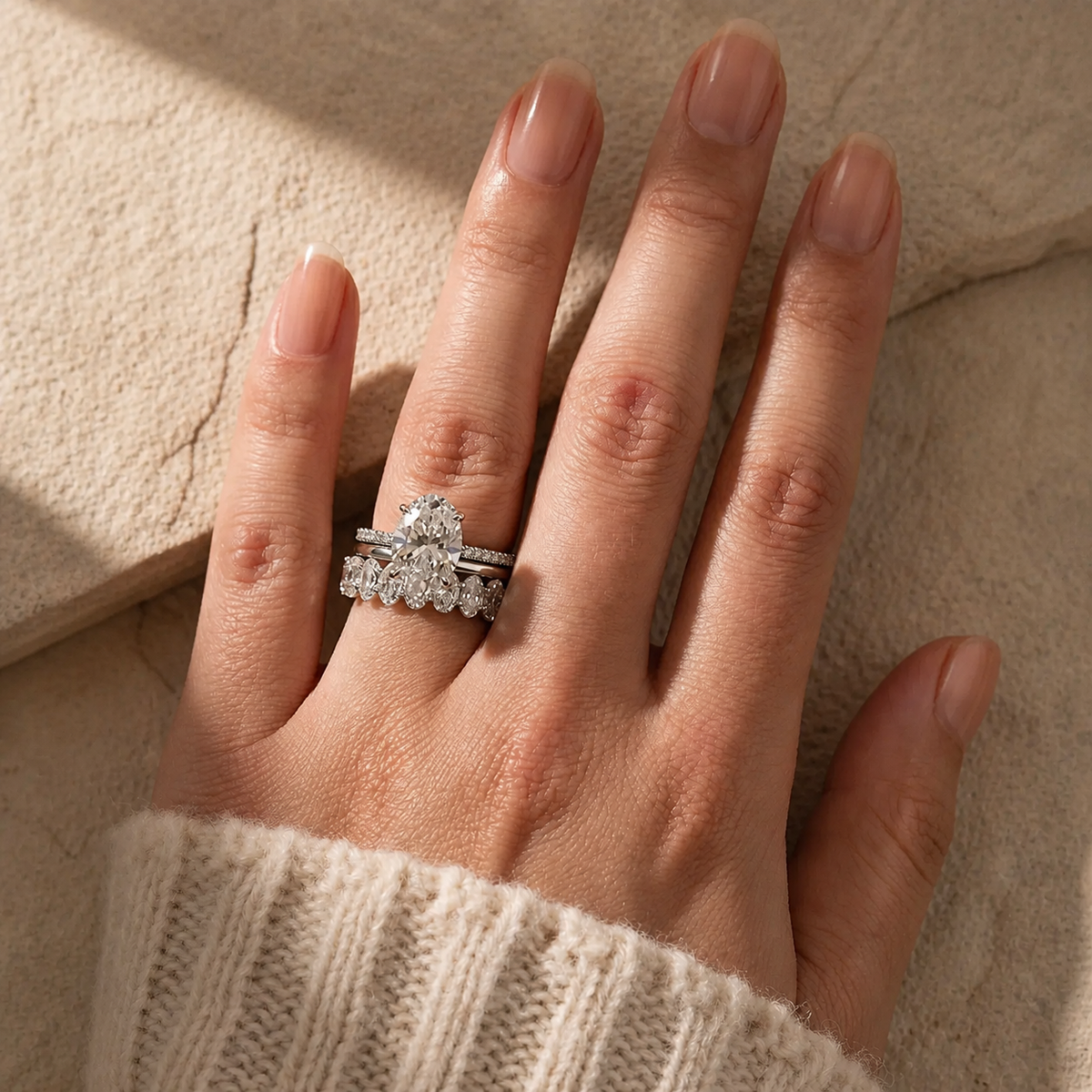 Elara three-piece oval wedding ring set in white gold – worn view