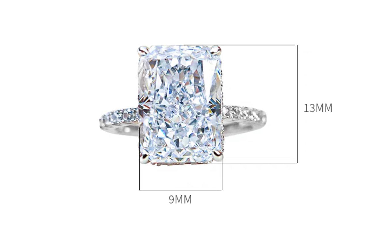 Aurora radiant-cut pavé ring dimensions showing a 9 by 13 millimetre center stone
