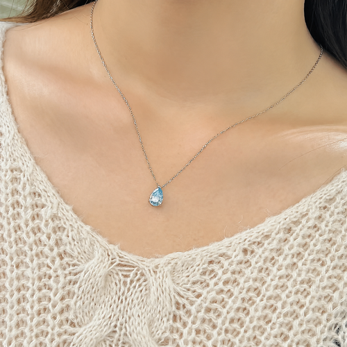 Model wearing the LAVEELLE Azure blue pear-cut pendant necklace